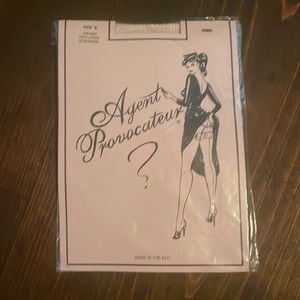 Agent provocateur pink fishnet with Lycra stockings. Size B